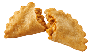 El Monterey Chicken and Cheese Empanada broken up to show filling