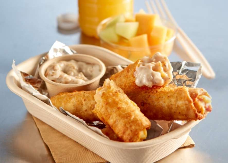Tornados® Breakfast Dippers with juice and a bowl of fruit