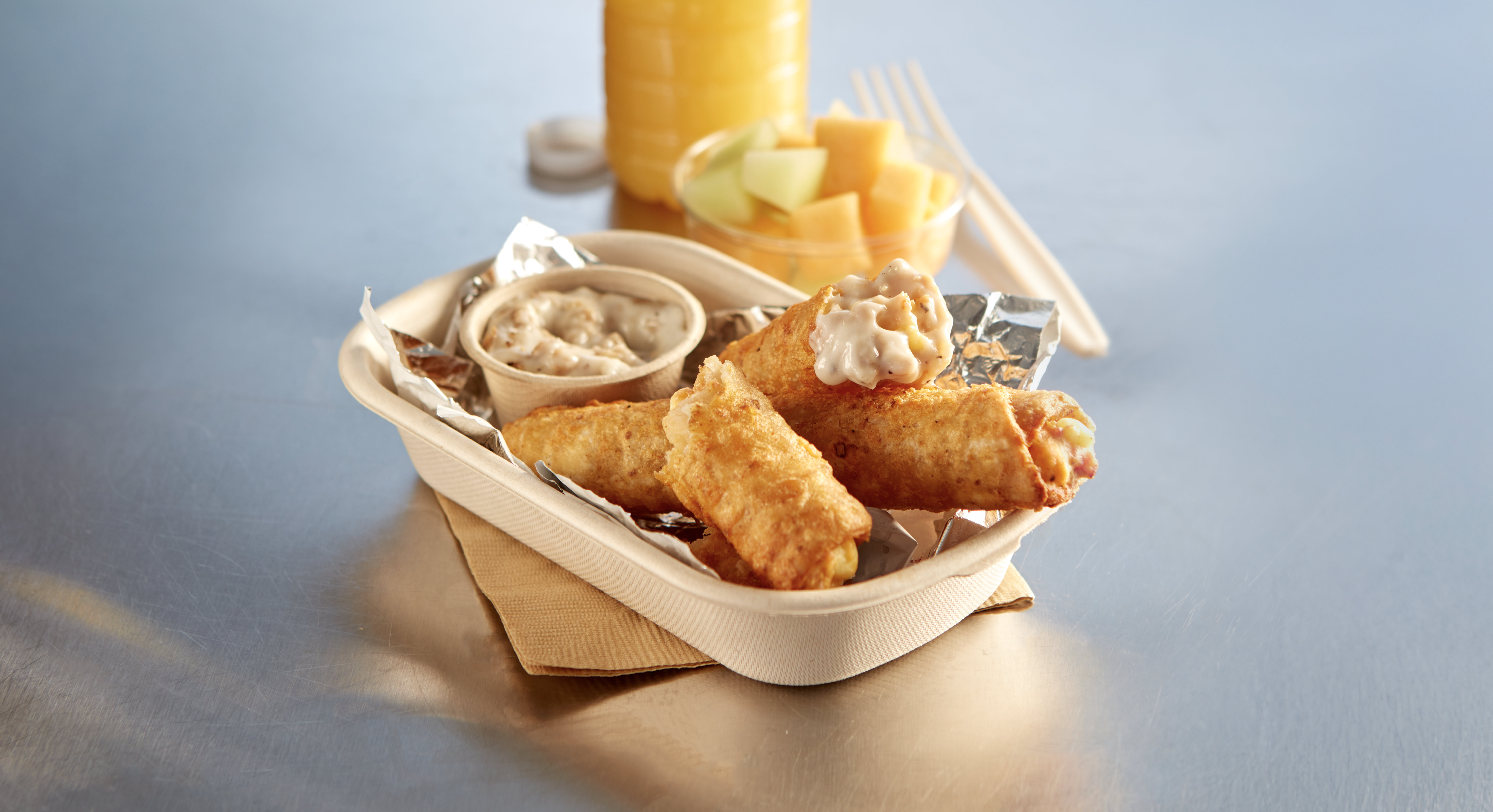 Tornados in a food boat with dipping sauce