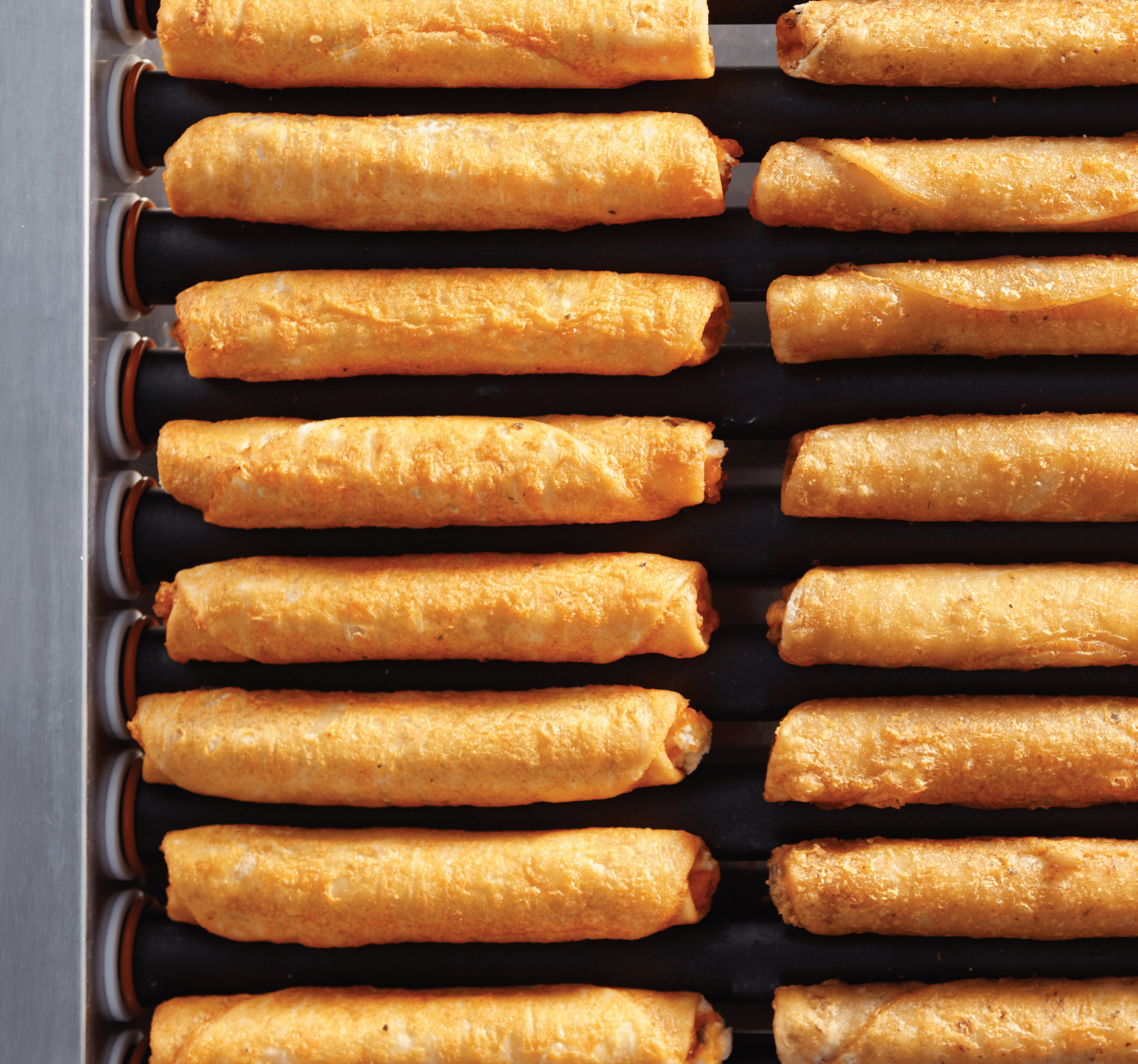 Taquitos on a roller grill